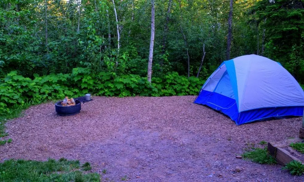 camp site with tent and fire pit