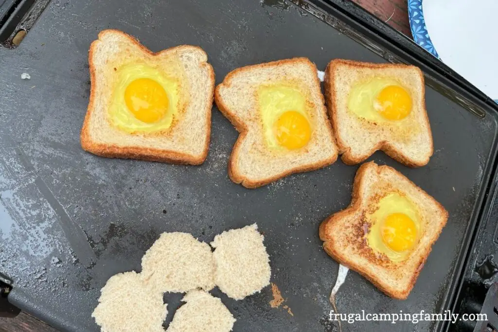 toast with egg in the middle, cooked on griddle