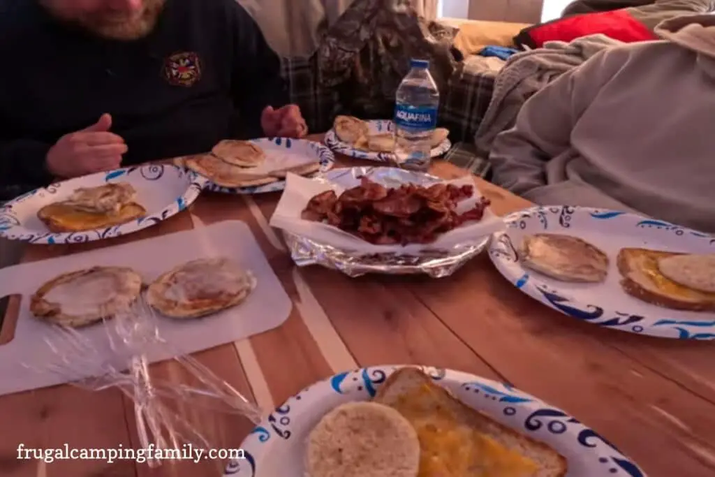 Family breakfast in the popup camper