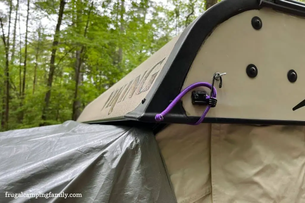 Attaching the diy bunk end cover to the popup camper with eye bolt