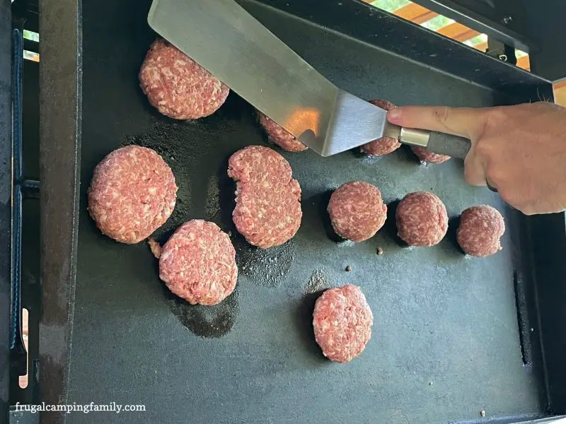 Sausage patties on a griddle