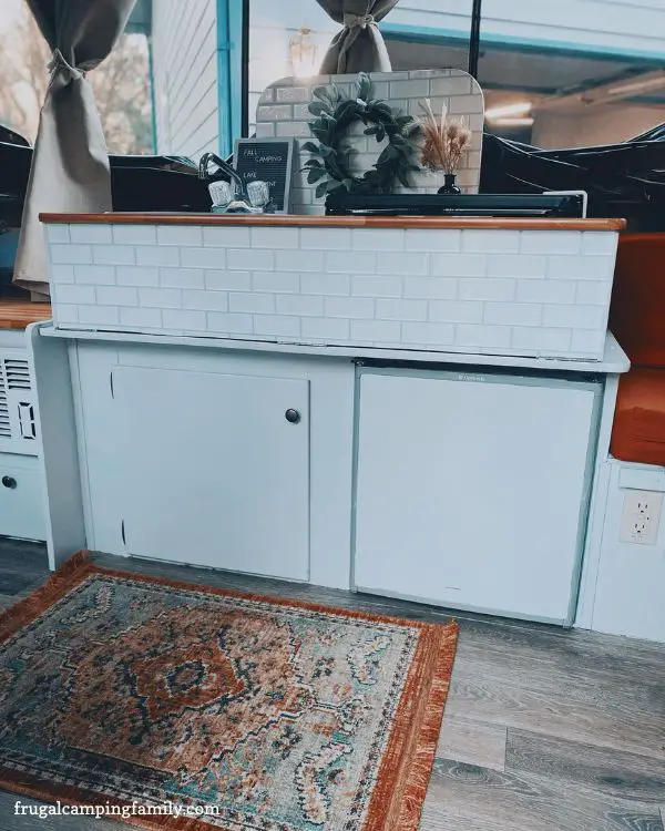 painted cabinets and sticky backsplash tile