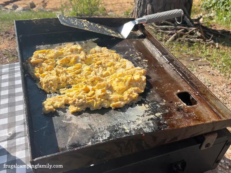 scrambled eggs on a griddle