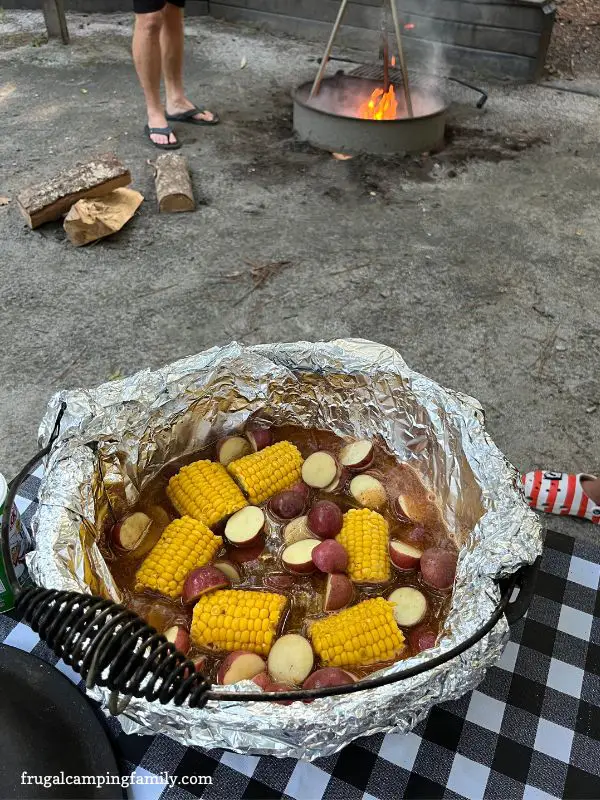 corn and potatoes in dutch oven